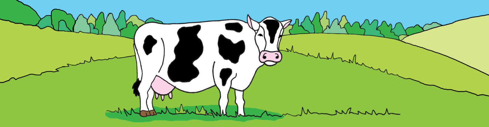 vaca pastando en el campo